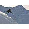 young healthy woman skiing on fresh snow at winter season in france alps