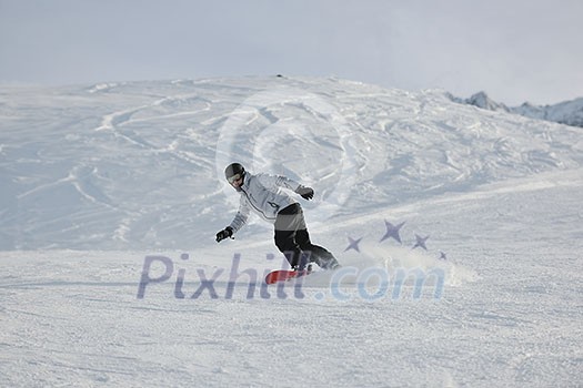 young athlete man have fun during skiing sport on hi mountain slopes at winter seasson and sunny day