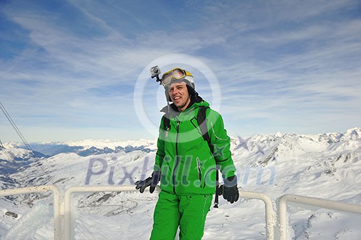 young athlete man have fun during skiing sport on hi mountain slopes at winter seasson and sunny day young athlete man have fun during skiing sport on hi mountain slopes at winter seasson and sunny day