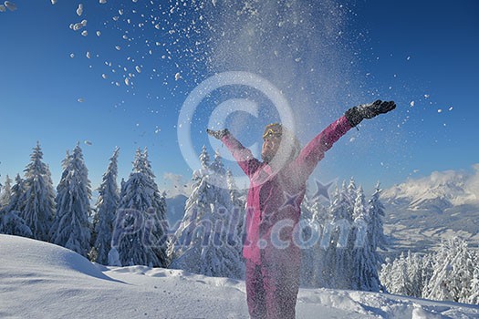 happy young ski woman at mountaint top on winter have fun