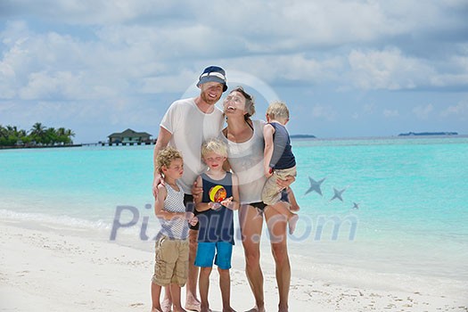 Portrait of a happy family on summer vacation at beach Portrait of a happy family on summer vacation at beach