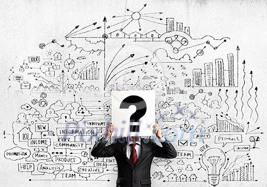 Businessman hiding his face with sheet of paper with sketches at background Businessman hiding his face with sheet of paper with sketches at background