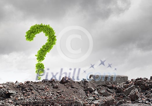 Conceptual image with green question mark growing on ruins Conceptual image with green question mark growing on ruins