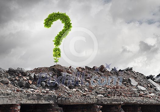Conceptual image with green question mark growing on ruins