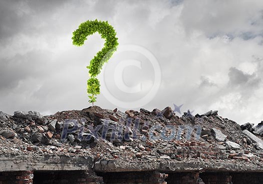 Conceptual image with green question mark growing on ruins Conceptual image with green question mark growing on ruins
