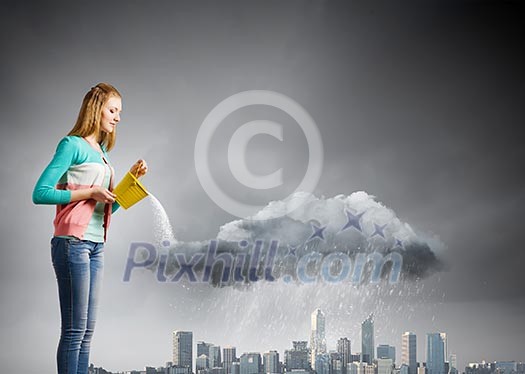 Young woman in casual pouring water on city