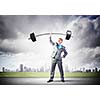 Image of strong businessman lifting barbell above head with one hand