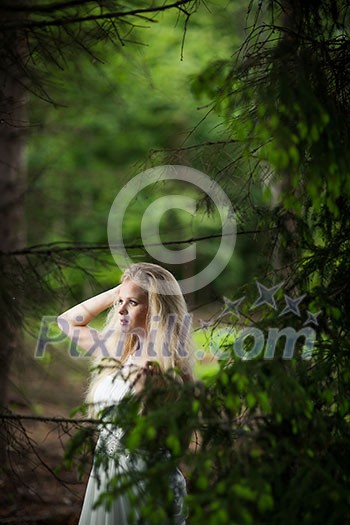 Lovely bride outdoors in a forest