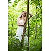 Lovely bride outdoors in a forest