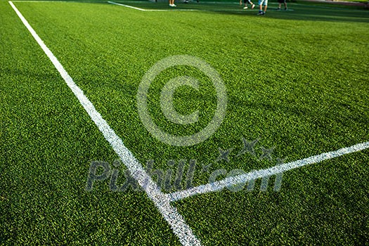 Soccery pitch - well cut grass of a soccer field Soccery pitch - well cut grass of a soccer field