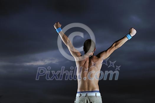 Man with his arms wide open
