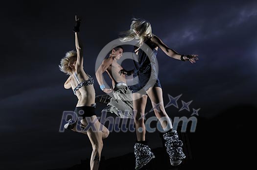 threen teens jumping in air representing disco and pary, joy and fun concept