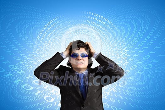 Image of depressed businessman tearing his hair