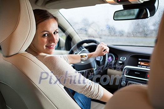 woman driving a car woman driving a car