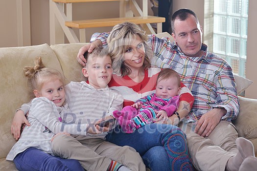 hapy young family have fun with their children at modern living room home indoors hapy young family have fun with their children at modern living room home indoors