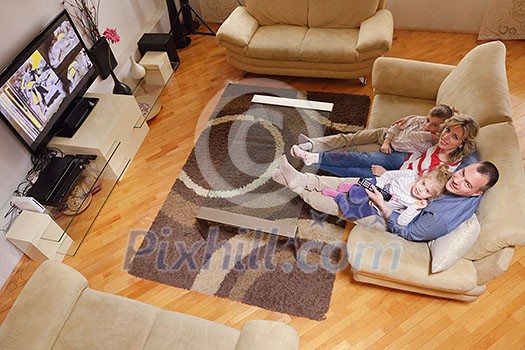 hapy young family have fun  with their children at modern living room home indoors