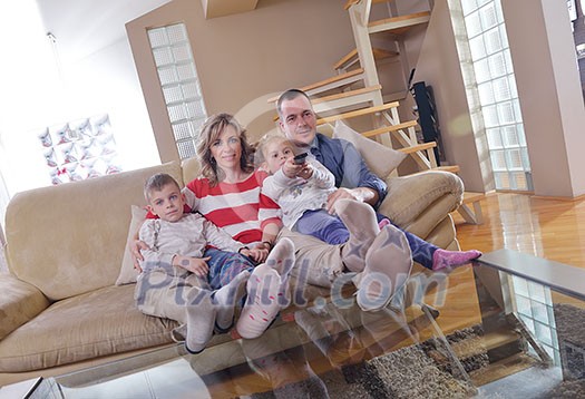 hapy young family have fun with their children at modern living room home indoors hapy young family have fun with their children at modern living room home indoors