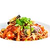 Pasta food with shrimps, herbs and mashrooms isolated on white background in studio