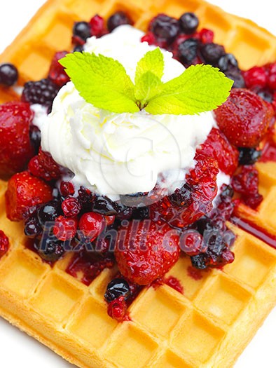 a selection of three italian gelato ice-cream scoops topped with nuts, chocolate, fruit served on crispy waffels