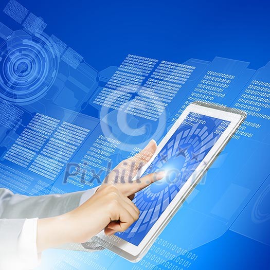 Close up image of human hand touching screen of tablet pc Close up image of human hand touching screen of tablet pc