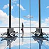 Image of woman in airport looking at taking off airplane