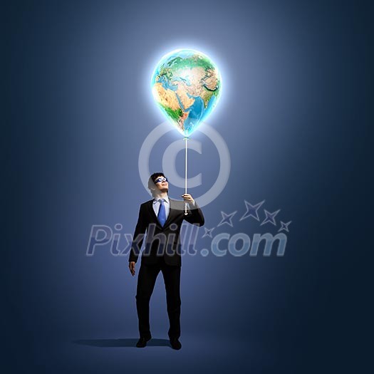 Image of businessman in goggles holding globe. Protect planet. Elements of this image are furnished by NASA Image of businessman in goggles holding globe. Protect planet. Elements of this image are furnished by NASA