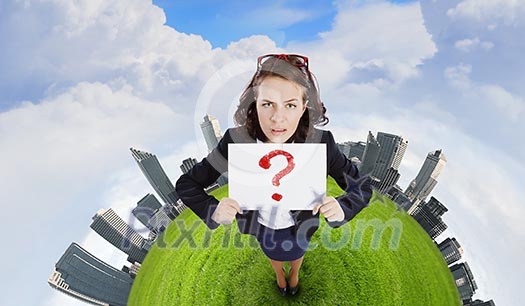 Top view of troubled businesswoman holding white banner Top view of troubled businesswoman holding white banner