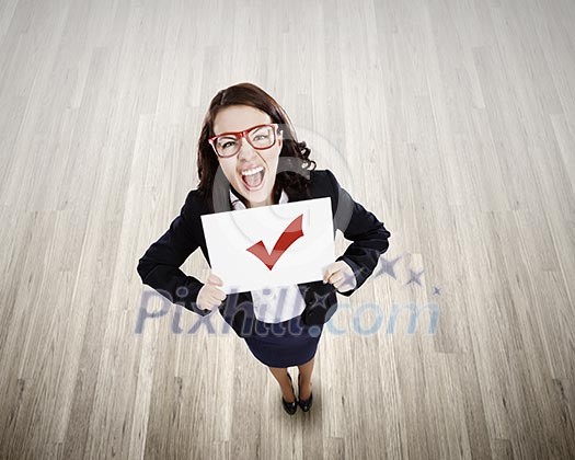 Top view of businesswoman holding white banner with red tick Top view of businesswoman holding white banner with red tick