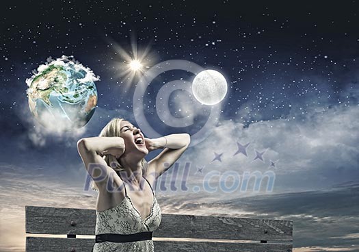 Young woman sitting on bench closing ears with palms and screaming. Elements of this image are furnished by NASA