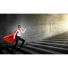 Young confident superman in mask and cape walking on ladder