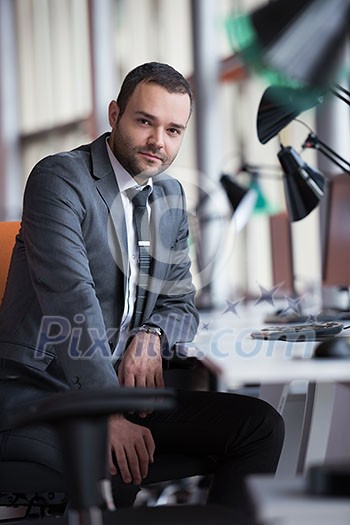 happy young business man portrait in bright modern office indoor happy young business man portrait in bright modern office indoor
