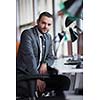 happy young business man portrait in bright modern office indoor