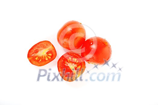 small wet fresh red tomato group isolated on white