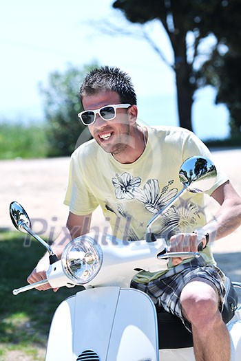 young man ride white retro vintage motorbike scooter young man ride white retro vintage motorbike scooter