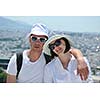 young couple portrait in love have romantic time on summer vacation holidays in greece santorini