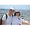 young couple portrait in love have romantic time on summer vacation holidays in greece santorini