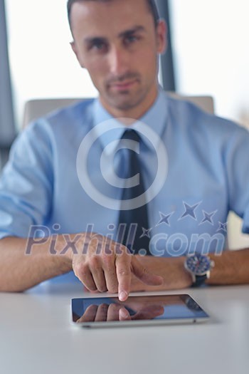 close-up of human hand  business man using tablet compuer at office