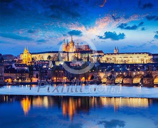 Travel Prague Europe concept background - view of Charles Bridge and Prague Castle in twilight. Prague, Czech Republic