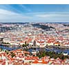 Aerial view of Charles Bridge over Vltava river and Old city from Petrin hill Observation Tower with tilt shift toy effect shallow depth of field. Prague, Czech Republic