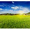 Countryside meadow field with sun and blue sky, Germany