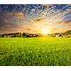 Idyllic rural scene of countryside meadow field on sunset, Germany