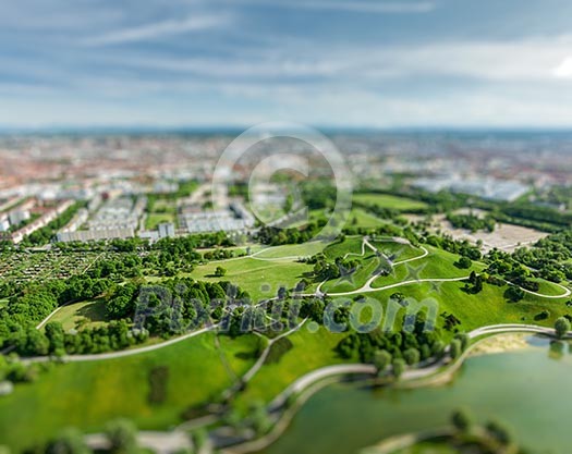 Aerial view of Olympiapark and Munich from Olympiaturm Olympic Tower with tilt shift toy effect shallow depth of field. Munich, Bavaria, Germany