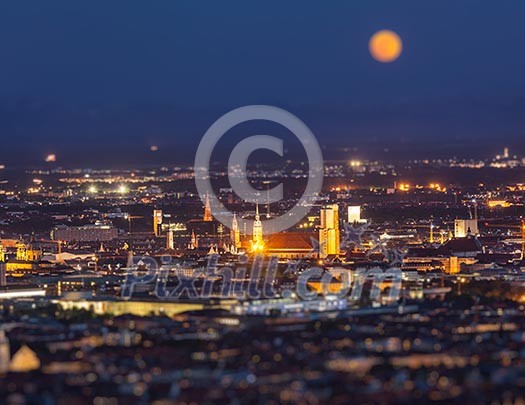 Night aerial view of Munich from Olympiaturm Olympic Tower with tilt shift toy effect shallow depth of field. Munich, Bavaria, Germany