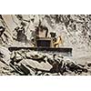 Bulldozer doing mountain road construction in Himalayas. Himachal Pradesh, India