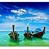 Long tail boats on tropical beach, Krabi, Thailand
