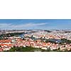 Aerial view of Charles Bridge over Vltava river and Old city from Petrin hill Observation Tower with tilt shift toy effect shallow depth of field. Prague, Czech Republic