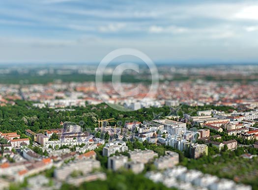 Aerial view of Munich from Olympiaturm Olympic Tower with tilt shift toy effect shallow depth of field. Munich, Bavaria, Germany Aerial view of Munich from Olympiaturm Olympic Tower with tilt shift toy effect shallow depth of field. Munich, Bavaria, Germany