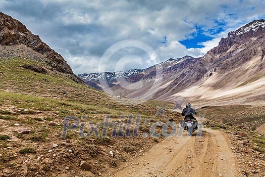Bike on mountain road in Himalayas. Spiti Valley, Himachal Pradesh, India