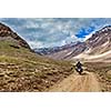 Bike on mountain road in Himalayas. Spiti Valley, Himachal Pradesh, India