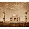 Taj Mahal. Indian Symbol - India travel background with grunge texture overlaid. Agra, India